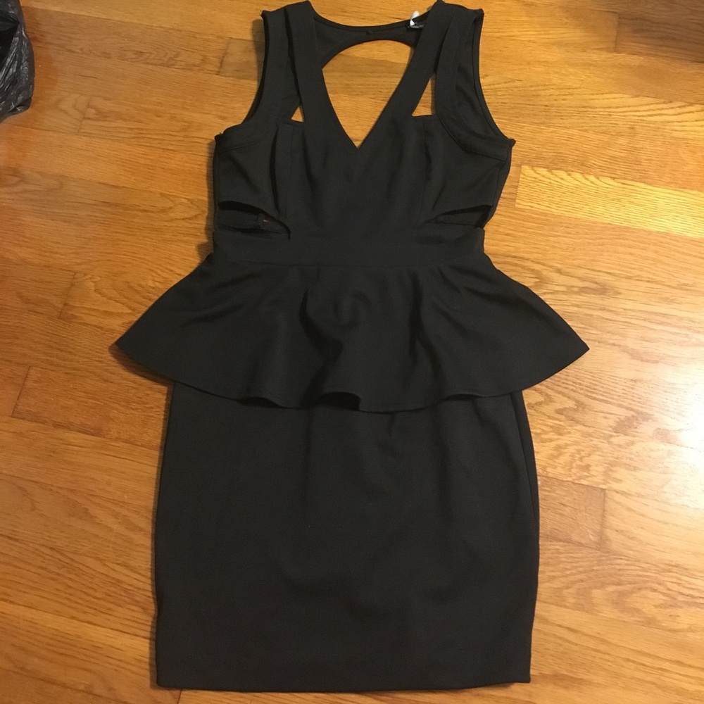 Black open back peplum dress