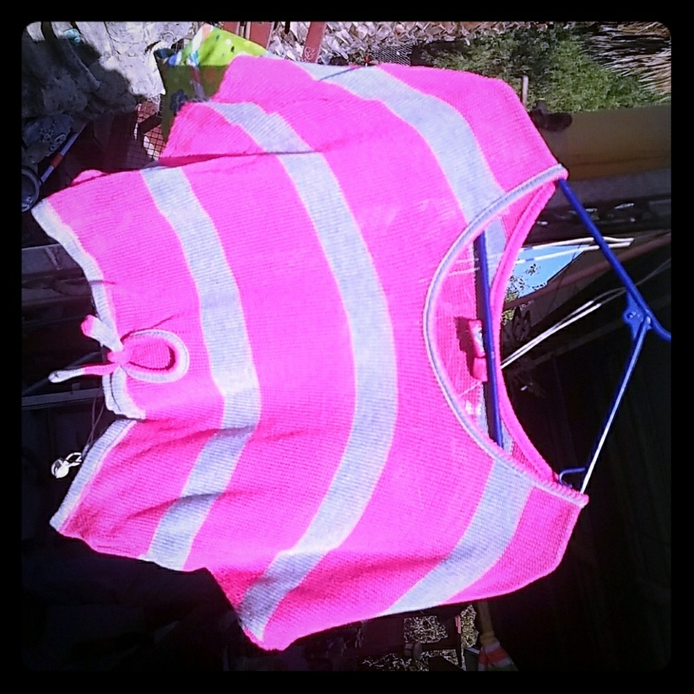 Light midriff cover up. Thin.