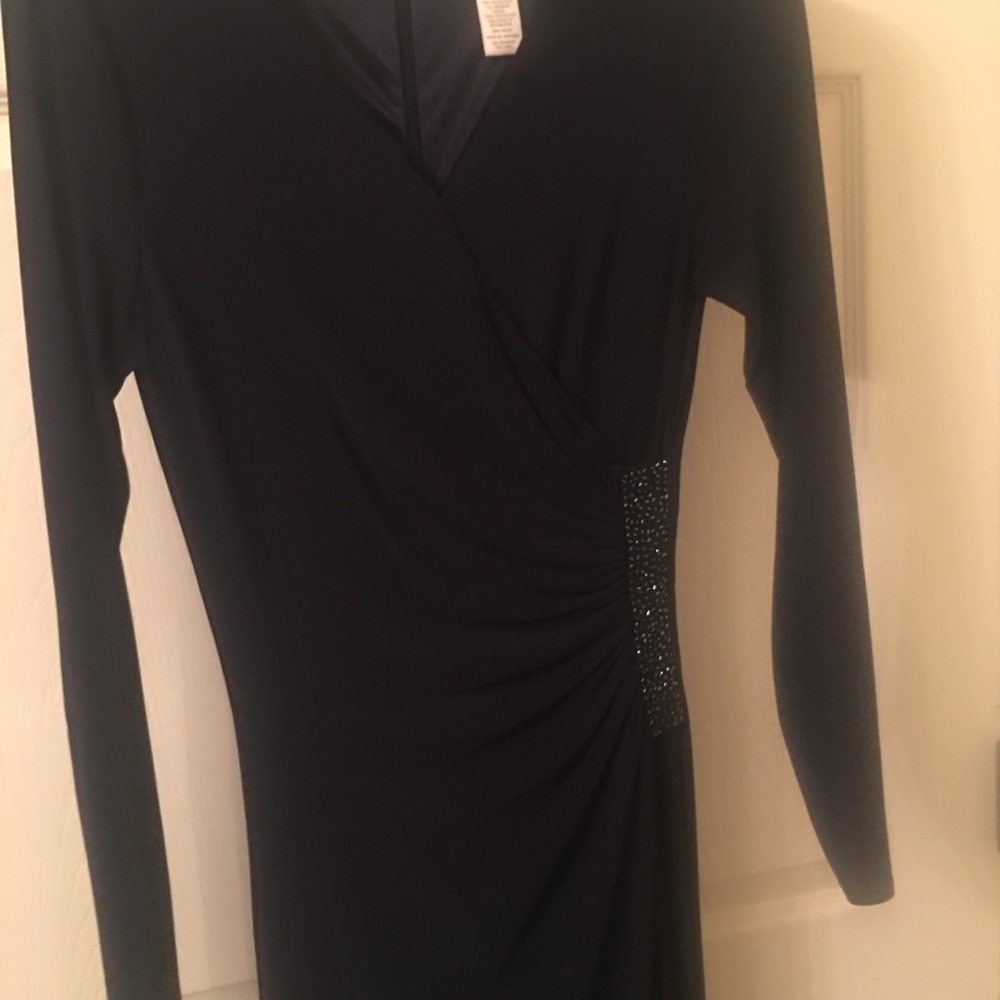 Long sleeve floor length dress, navy blue. Vneck.