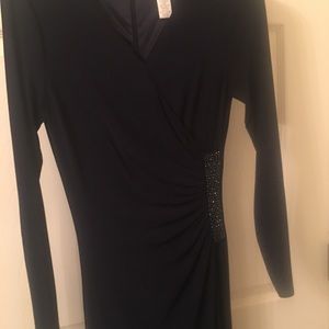 Long sleeve floor length dress, navy blue. Vneck.