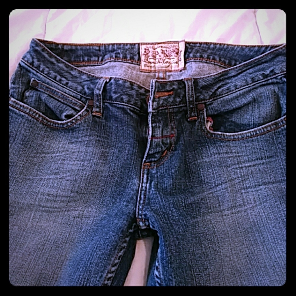 Barely worn American Rag bootcut jeans