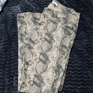 Snakeskin print skinny jeans