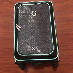 Guess carry-on luggage and duffle bag