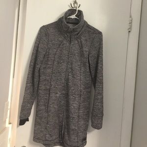 Long grey sweater-storm cuffs. Boots with tights