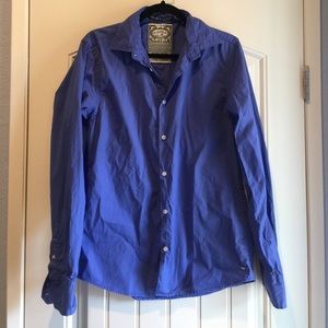 Men's blue button up dress shirt.