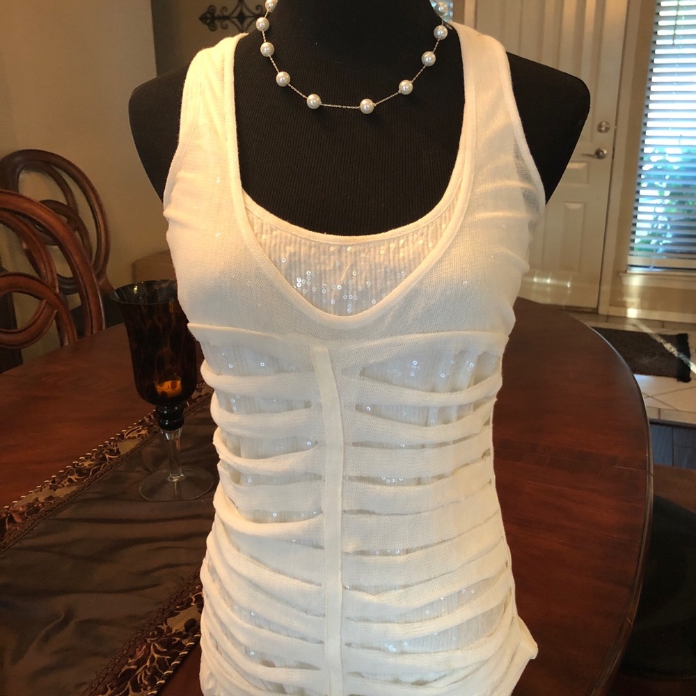 2 tops or 1. Beautiful off white tank top, small.