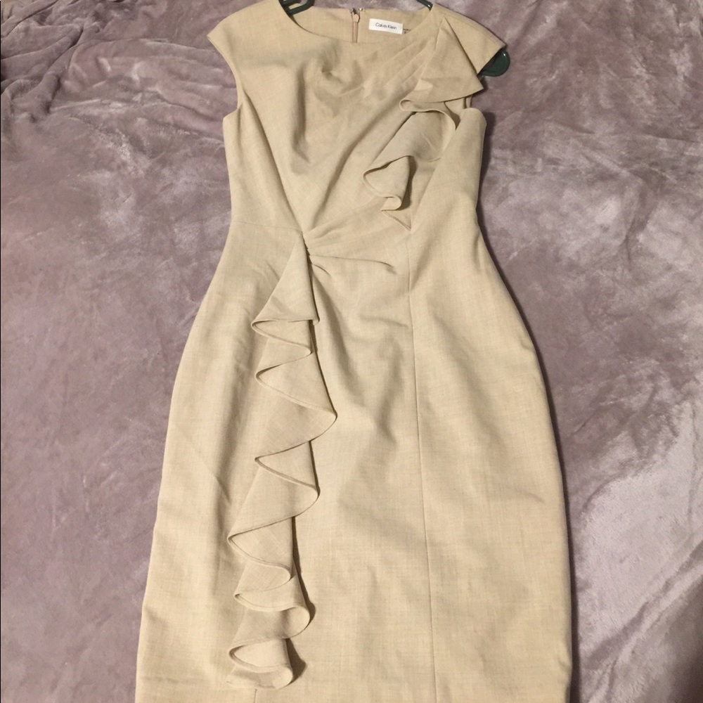 Tan dress with ruffle detail