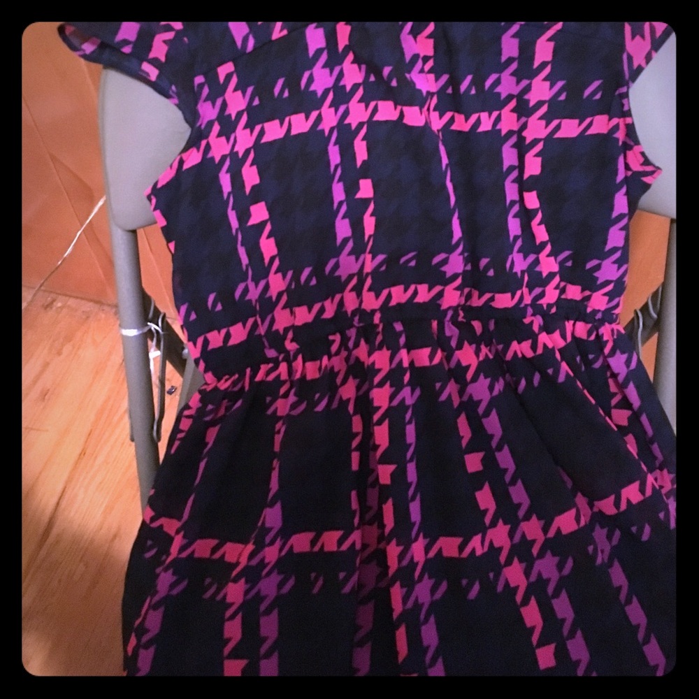 Knee length faux chiffon dress.