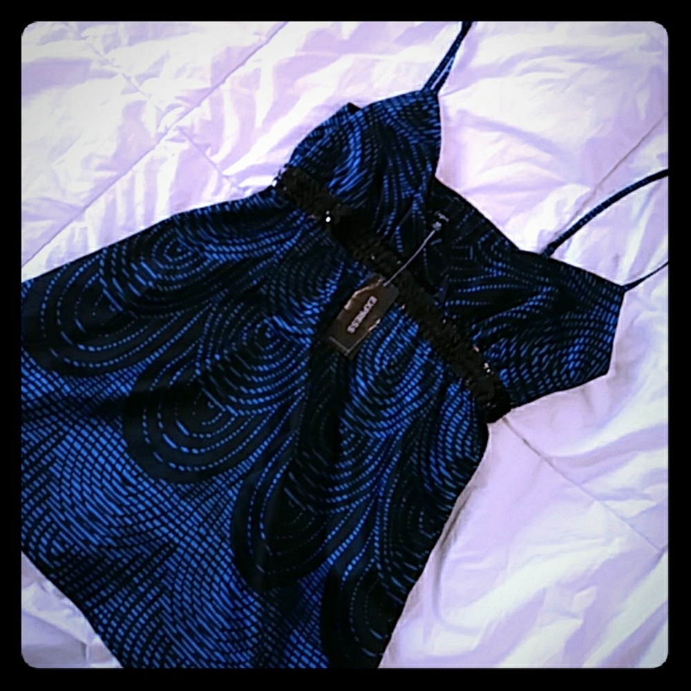 Express satin and sequined top.
