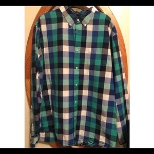 Plaid button up shirt. Plaid button up shirt.