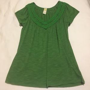 Green Anthropologie top with embroidered neckline