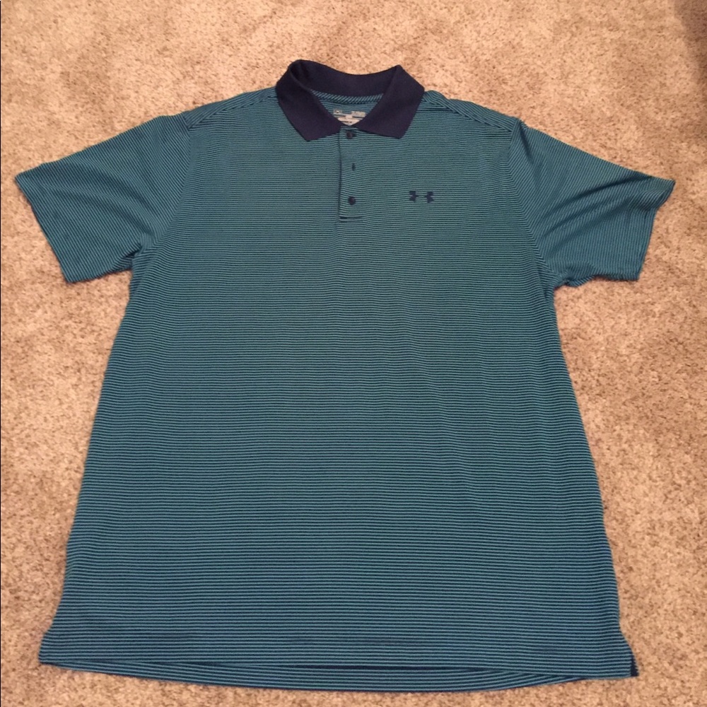 Under armour polo. Fits more like a large