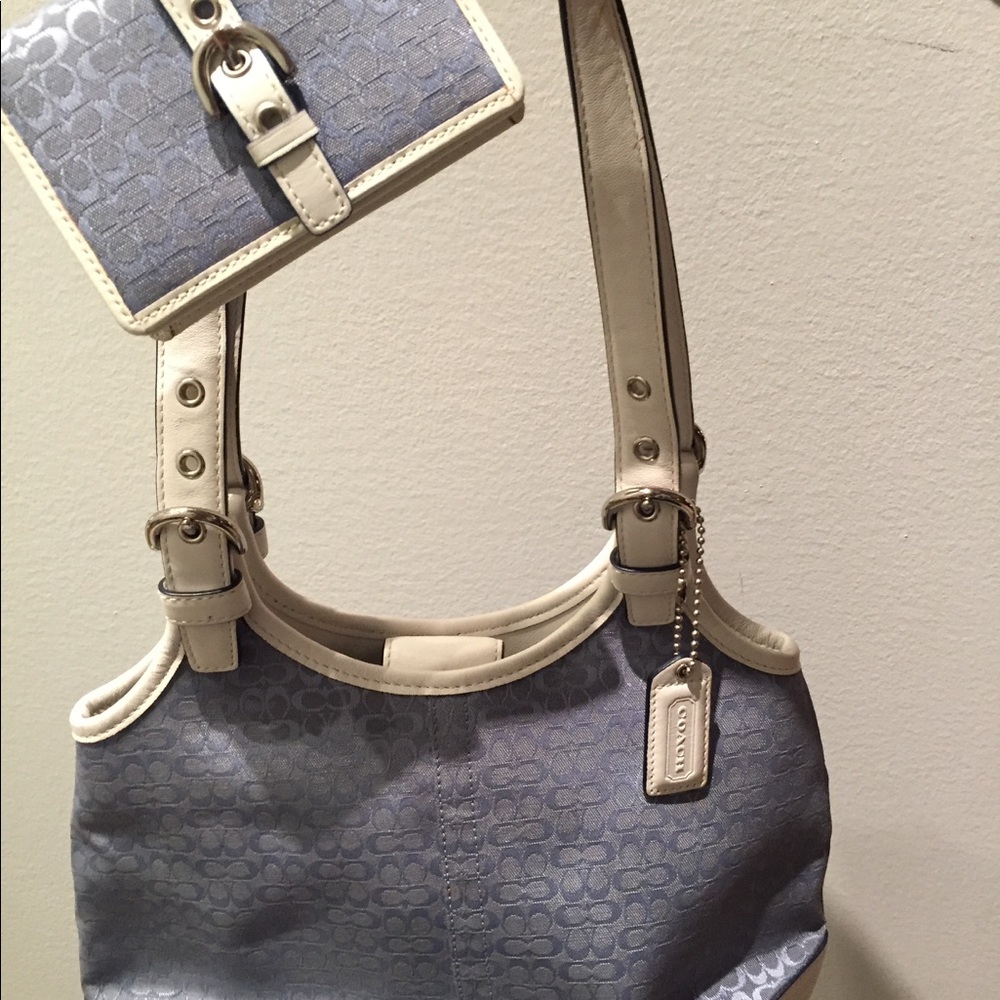 Coach small signature bag with matching wallet.