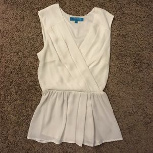 White faux wrap sleeveless blouse