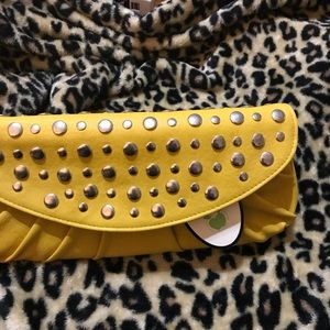 Mustard yellow and silver clutch