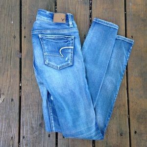 Ripped Blue Jeans American Eagle