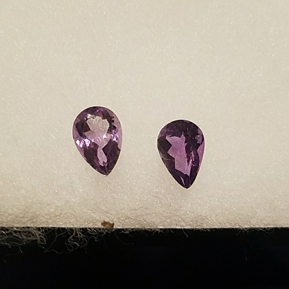 Unset gems. Purple tear drops
