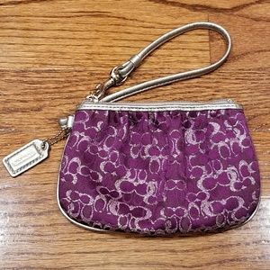 Purple and Silver Coach Wristlet