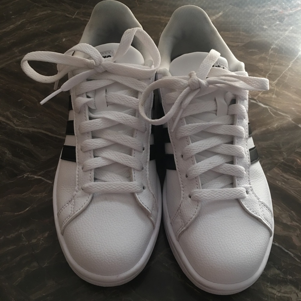 Adidas, size 7.5 traditional black and white 🤘