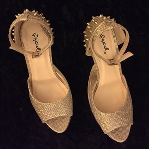 Gold gravity spiked heels Gold gravity spiked heels