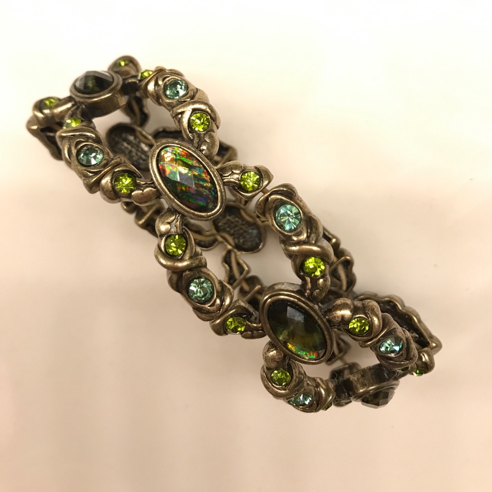 Green stone gold tone bracelet