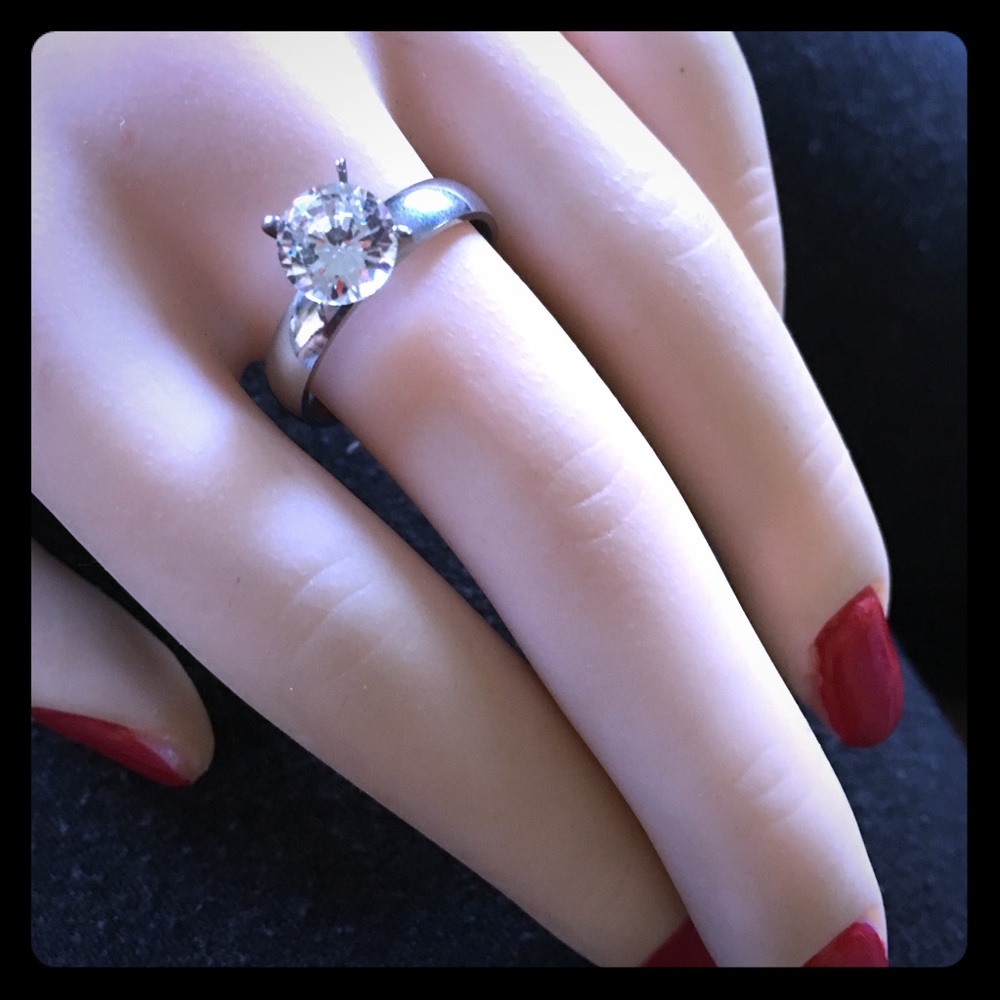 Silver/stainless steel engagement ring.