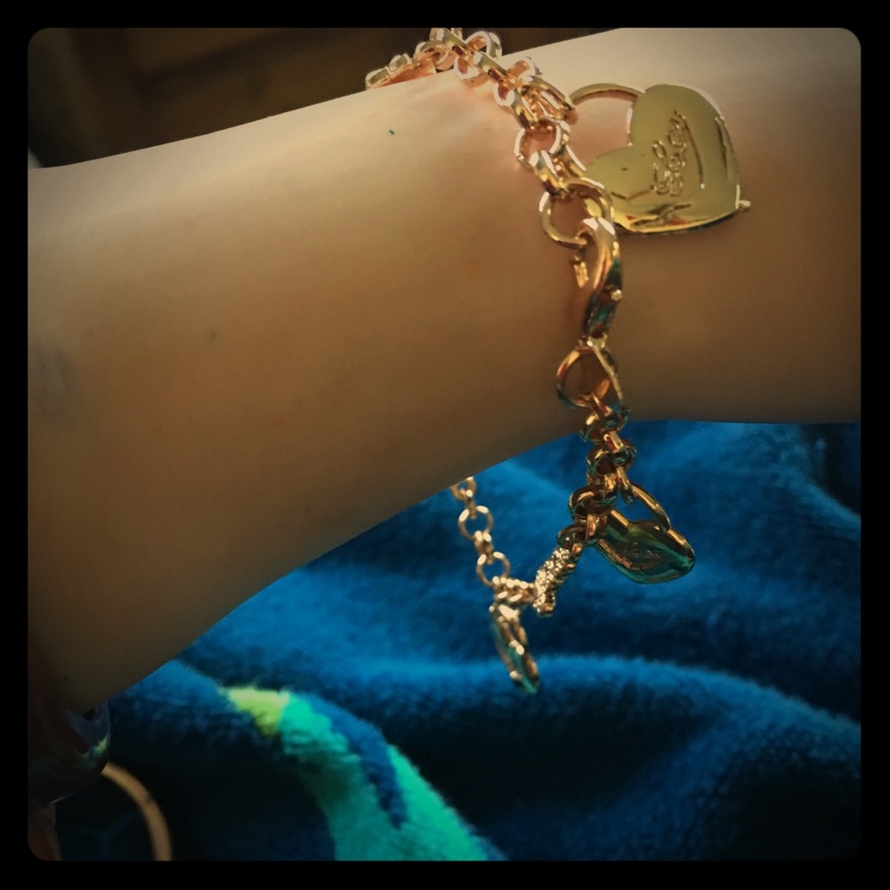 Rose gold/stainless steel with heart and love.