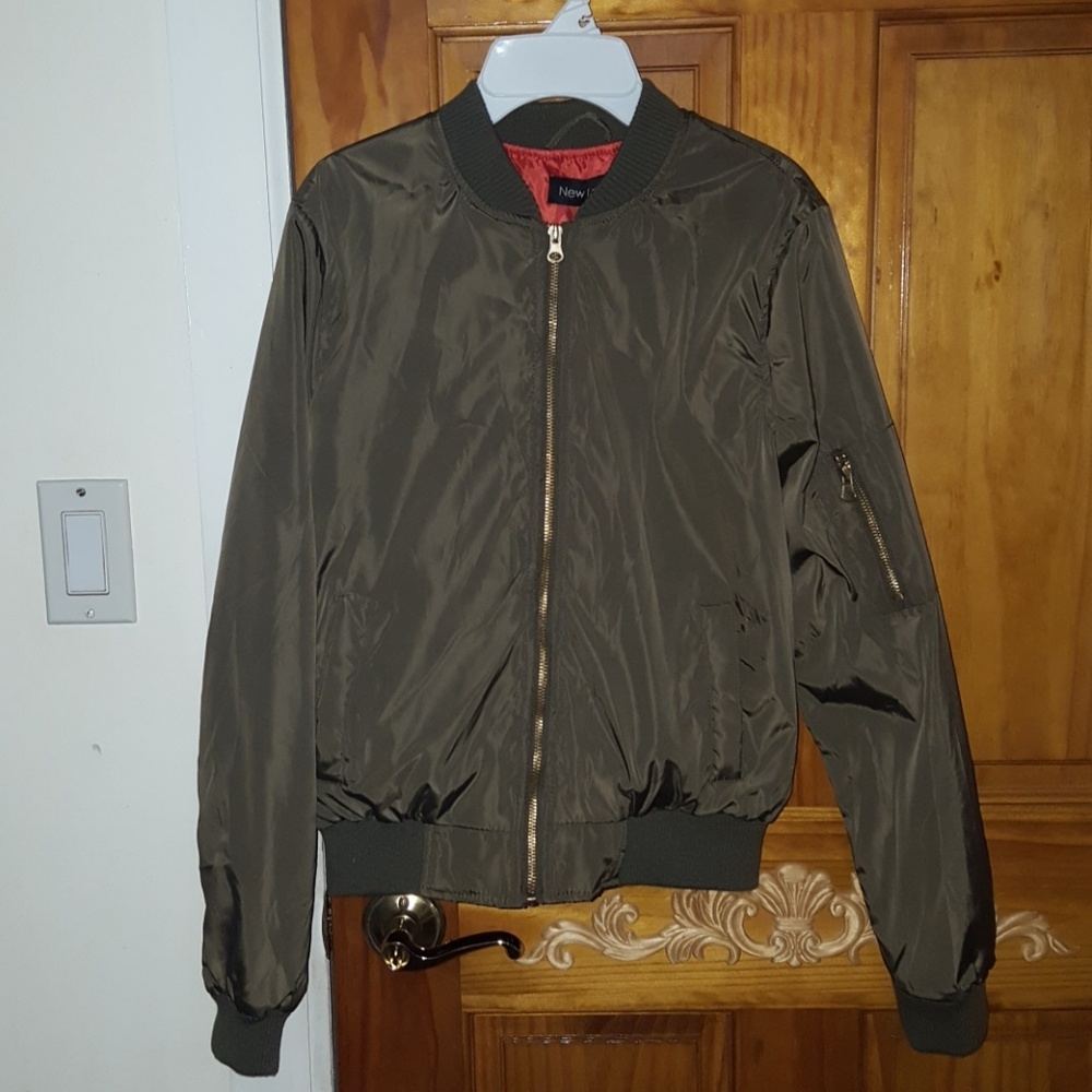 Olive green bomber jacket.