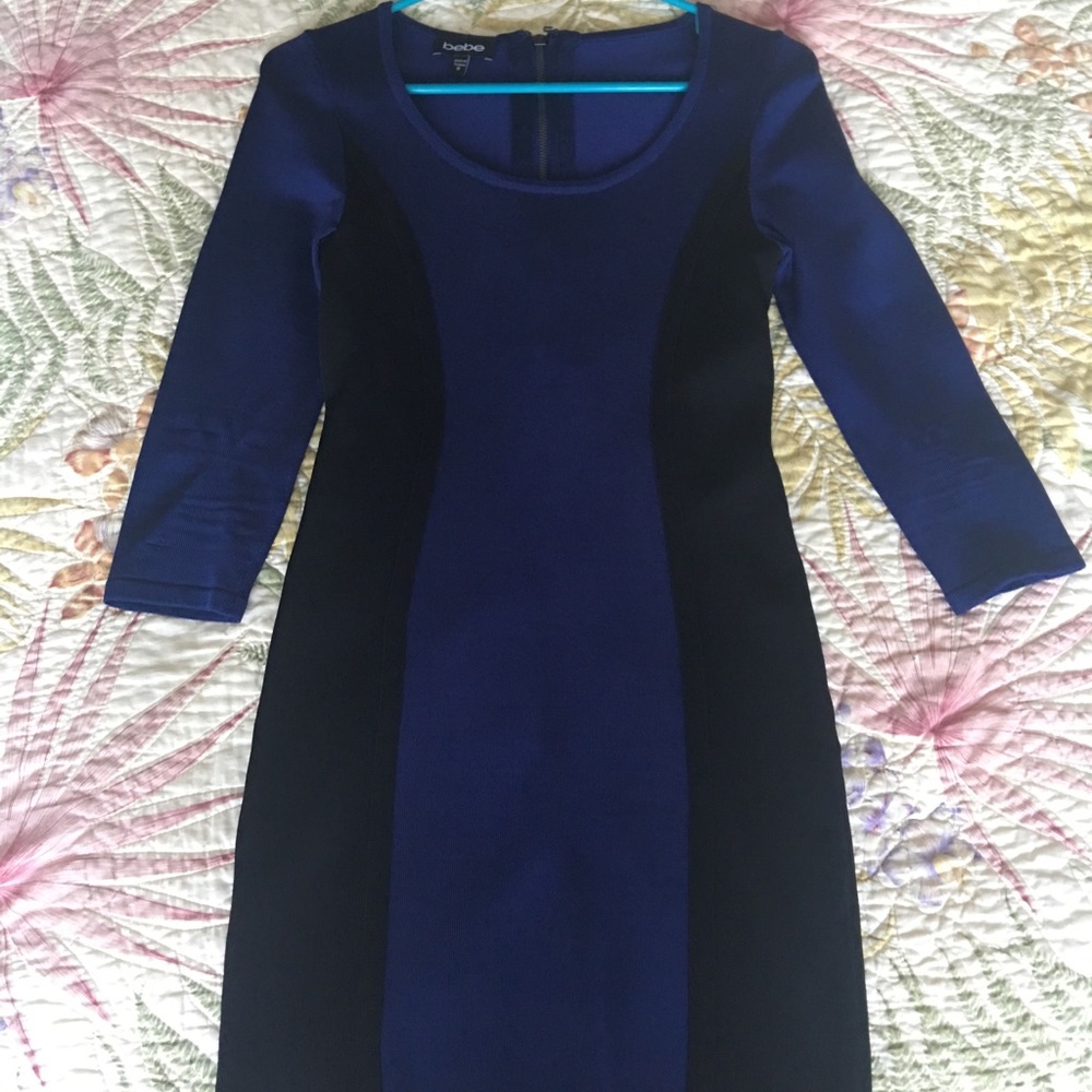 Purple and black long sleeve color block dress.