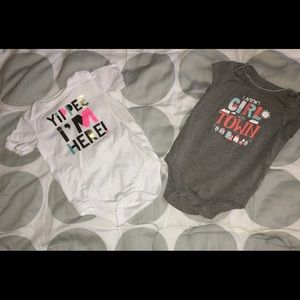 TWO onesie shirts..