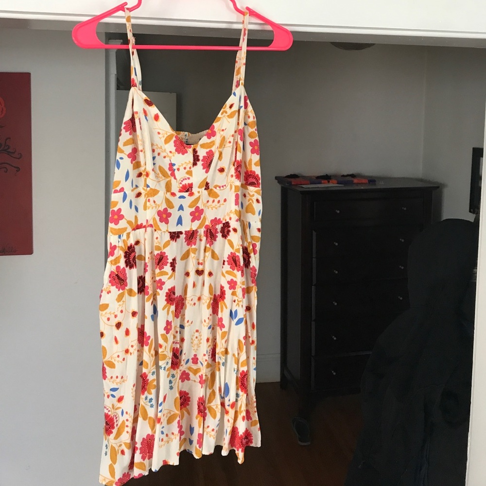 Colorful, flowery skinny strap dress