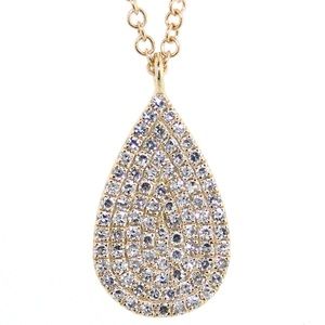 Diamond Pendant set in 14k yellow gold .19TCW