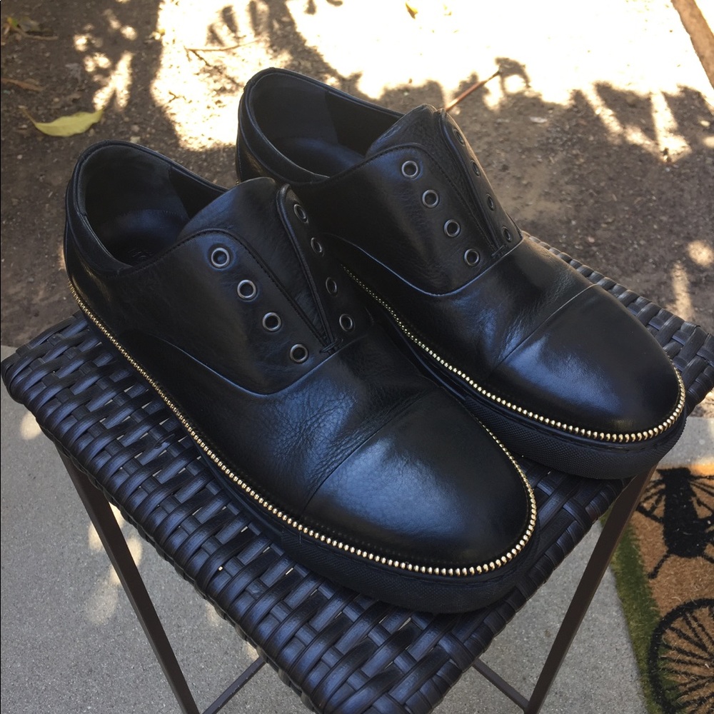 Alexander McQueen black leather shoes