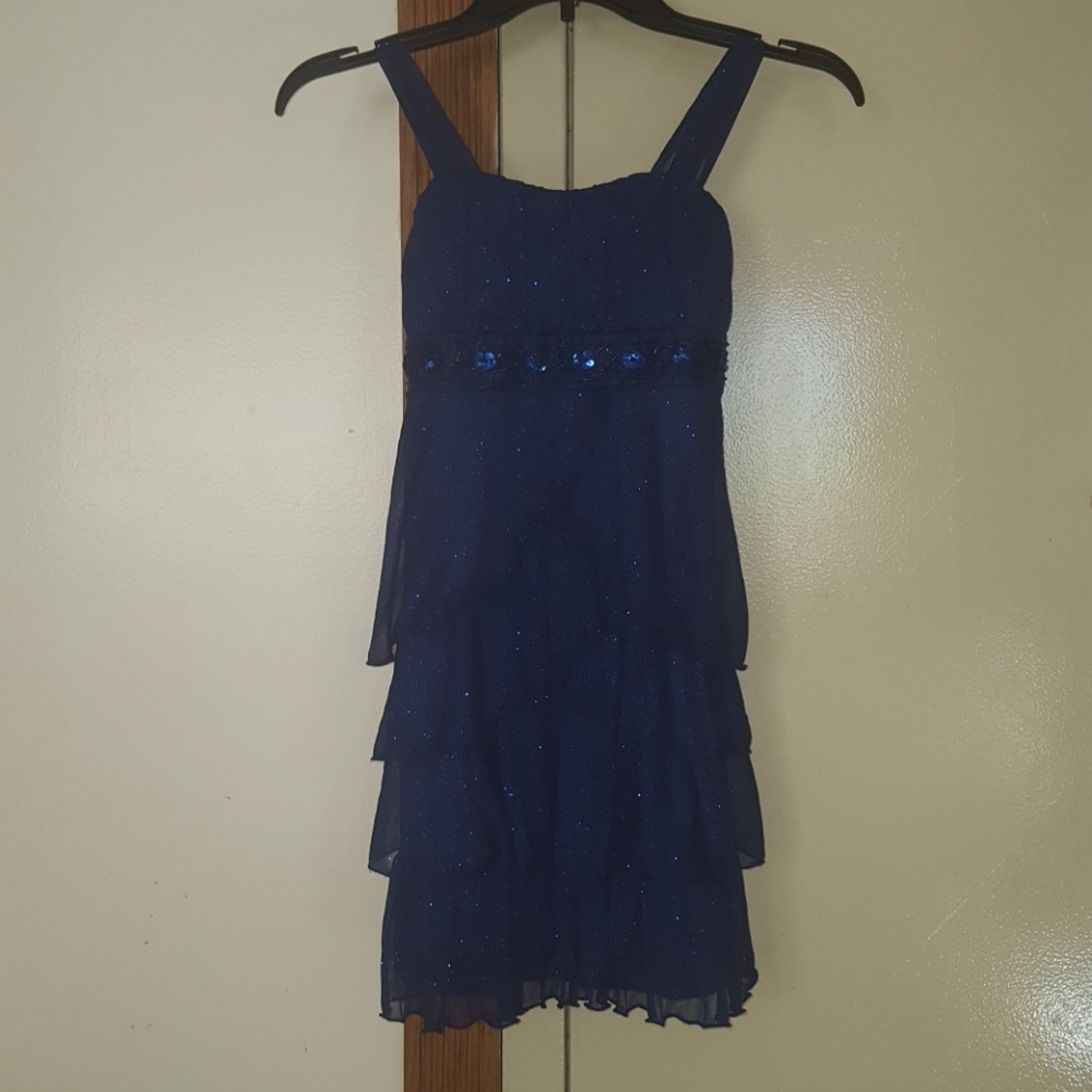 Royal blue ruffled dress with beading.