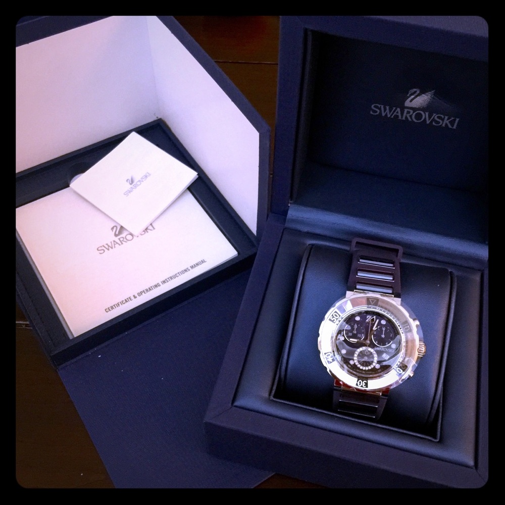 Brand new authentic Swarovski octet purple watch