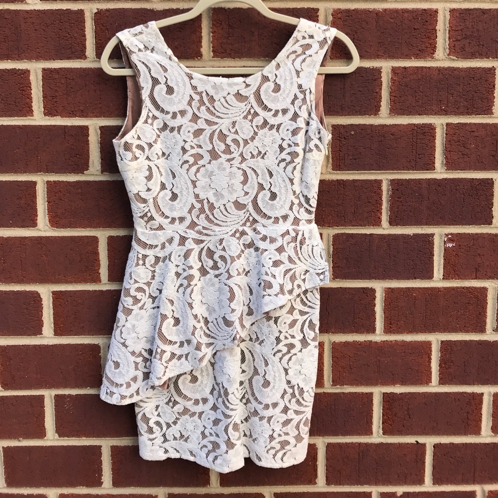 Cream lace peplum cocktail dress