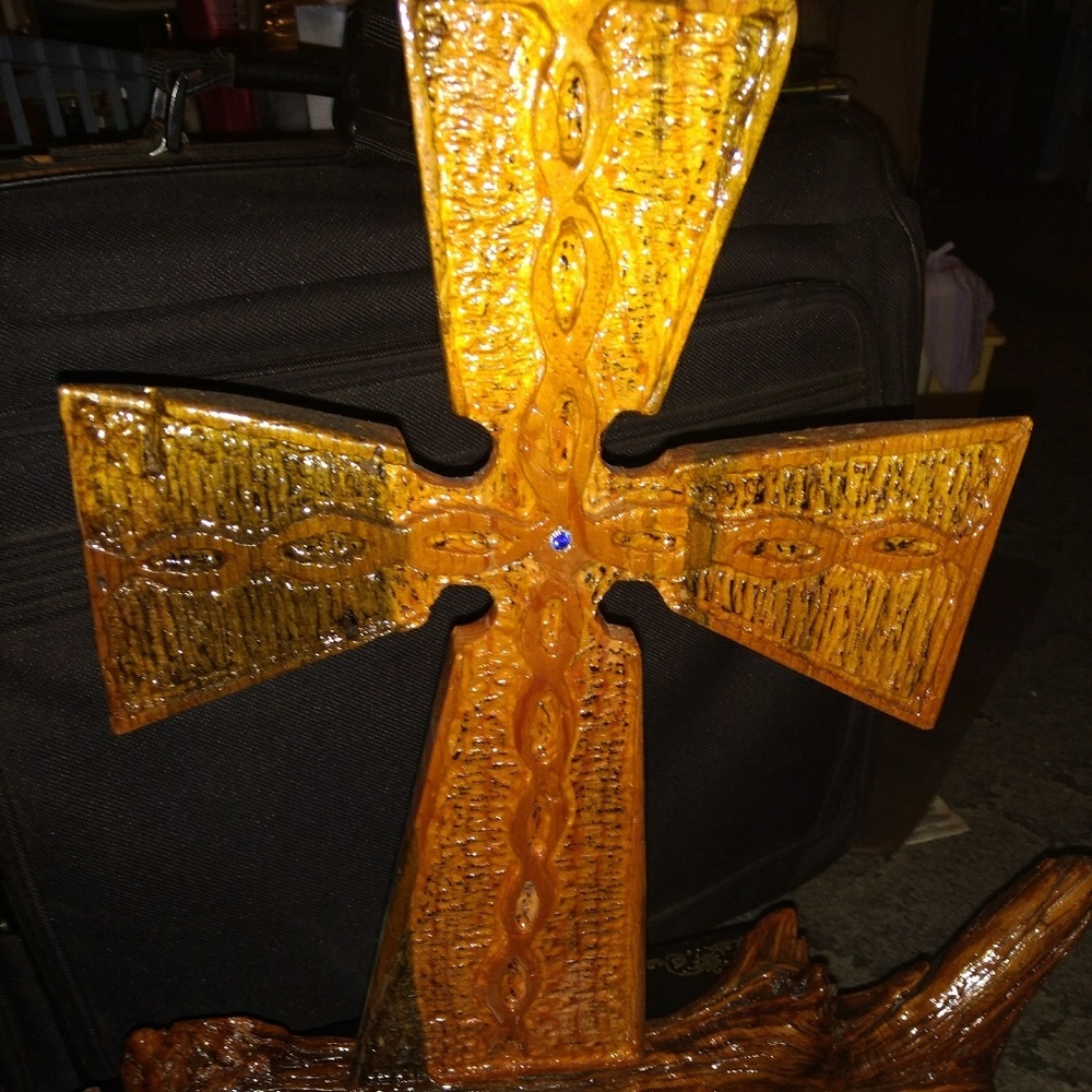 Handmade cross with blue gem in center