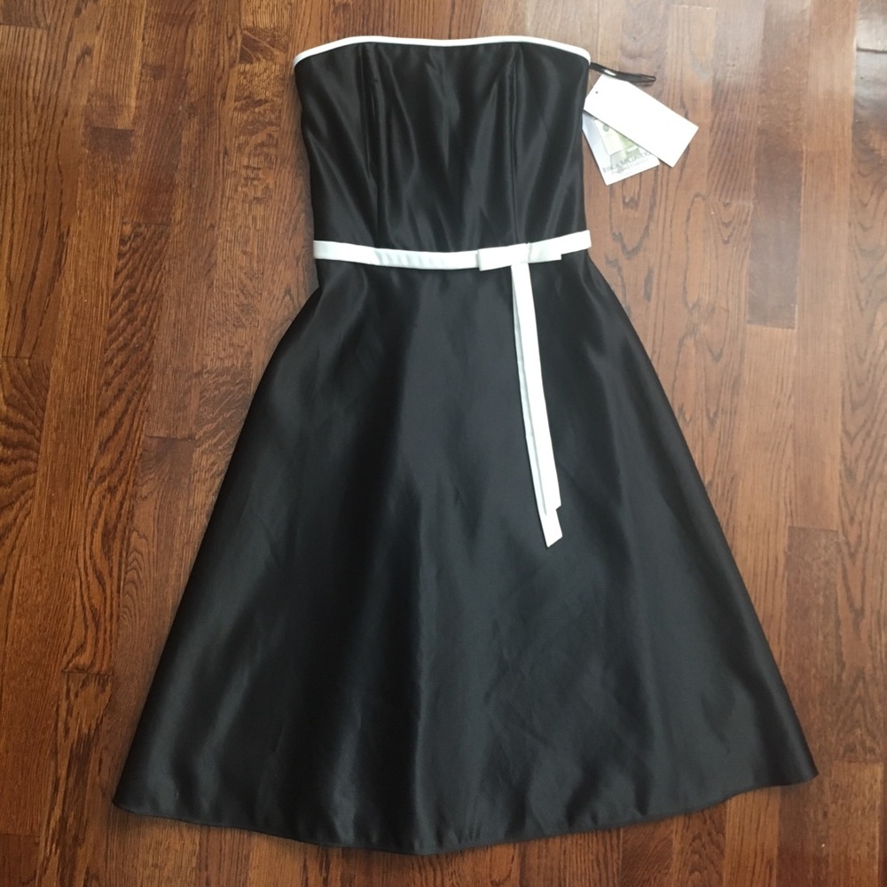 Silky black cocktail dress. Size 6. NWT.
