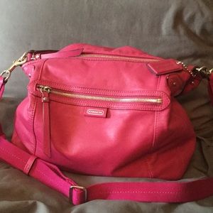 Dark pink Coach bag.
