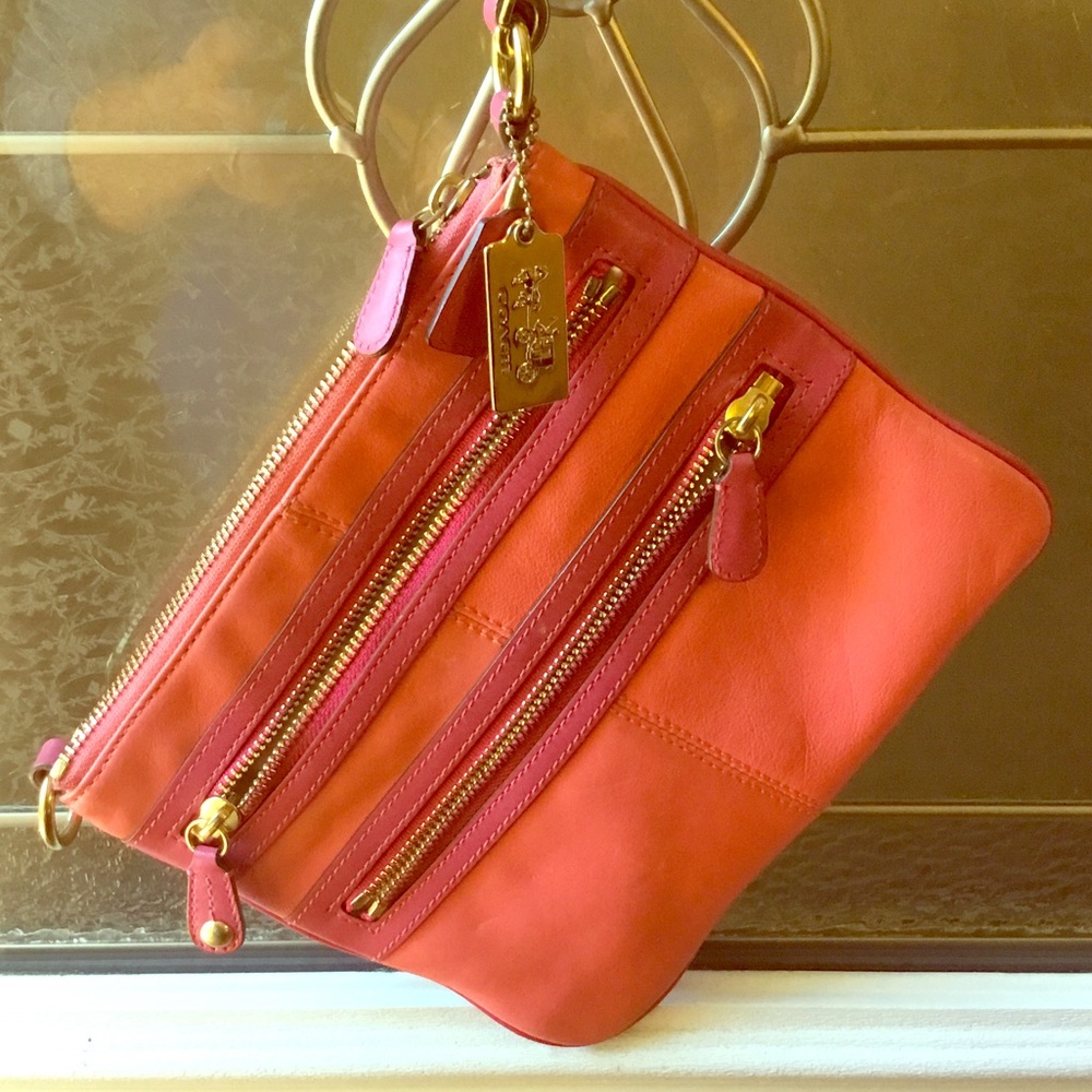 Pink and coral coach cross body bag