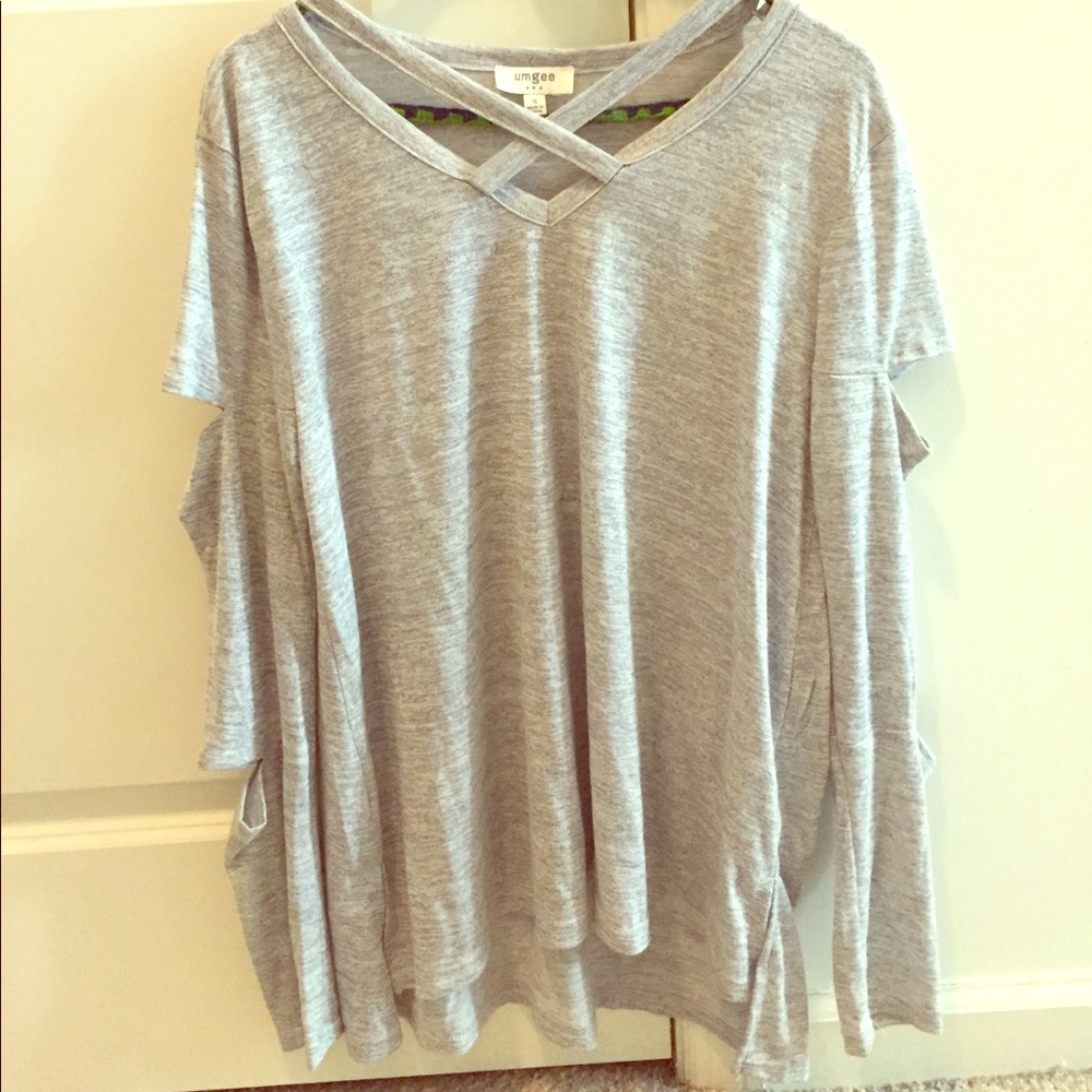 Umgee shirt with neck detail and sleeve cutouts