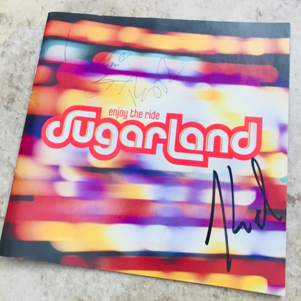 Signed autographed Sugarland cd case book