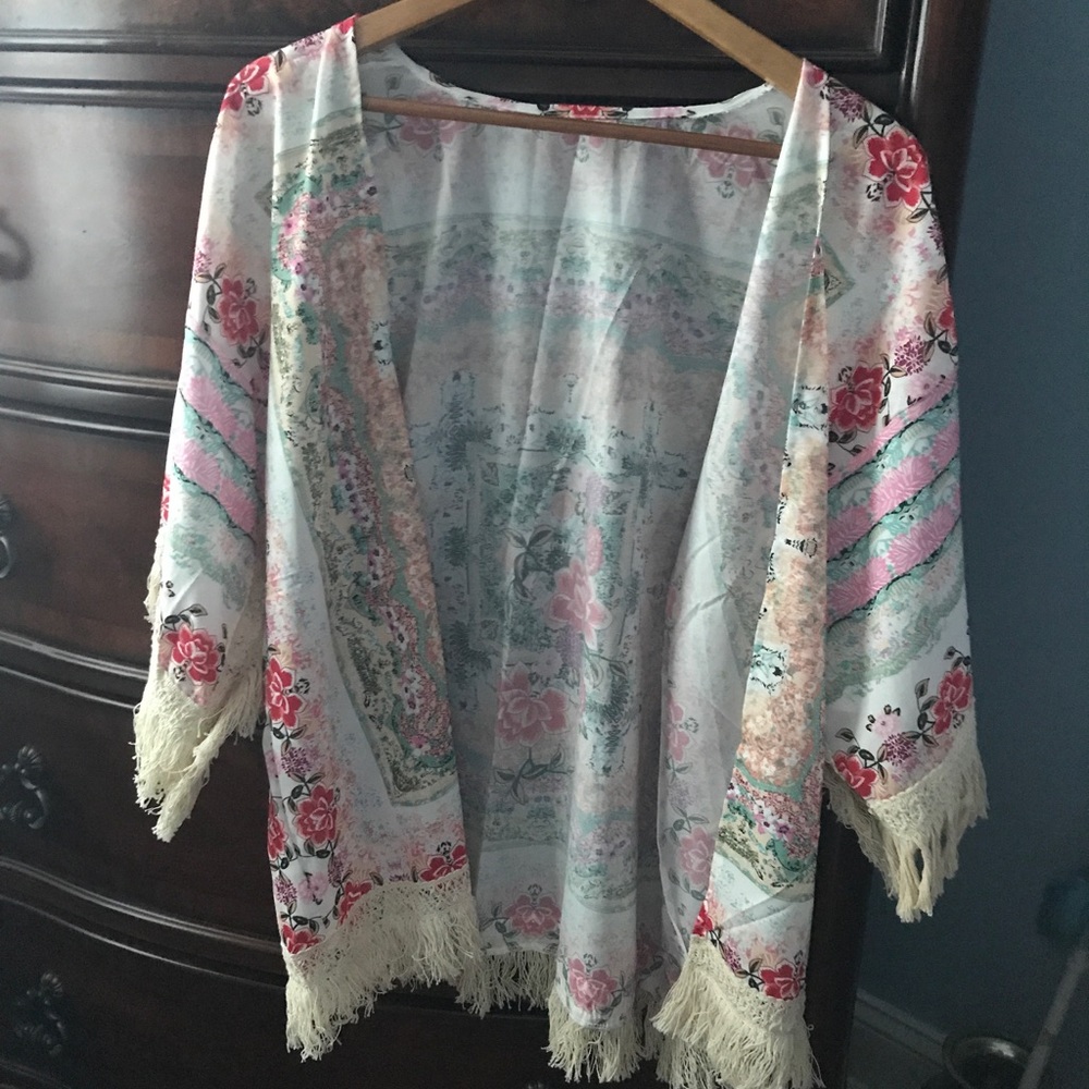 Kimono 100 % polyester , beautiful colors, .......