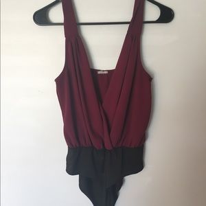 Maroon and black body suit