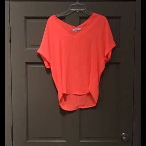 lush flowy pink-orange blouse