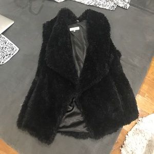 Beautiful faux fir never worn vest