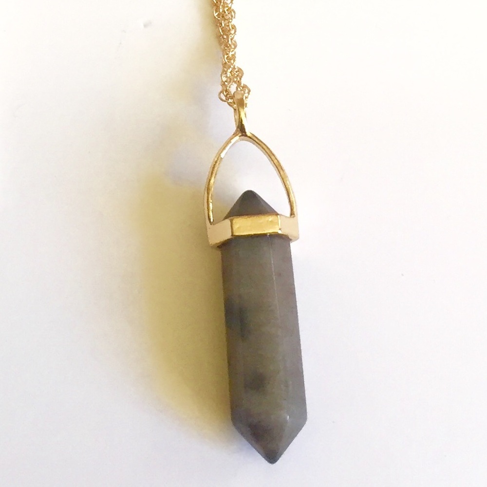 Grey crystal with gold chain