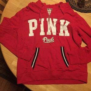 Pink brand hooded sweatshirt size large. Red/black