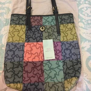 Blue-green colored kaos cuadrados bag