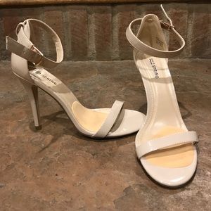 Call it SPRING heels, beige, size 8.5